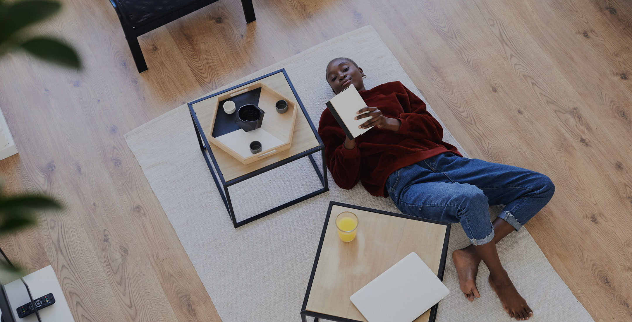 The Line Raleigh woman journaling on the floor