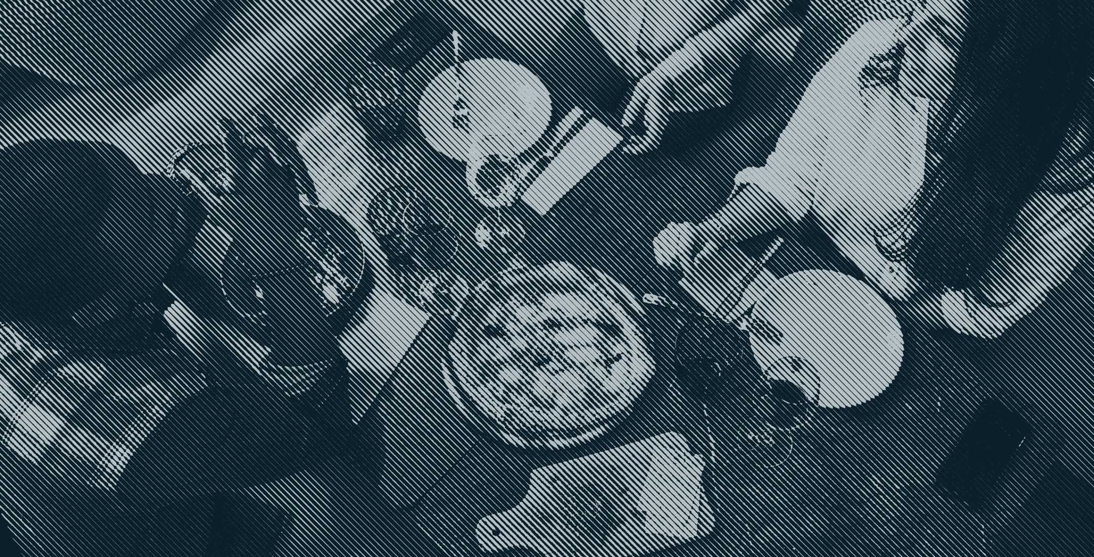 The Line Raleigh group of friends socializing in an indoor space eating pizza