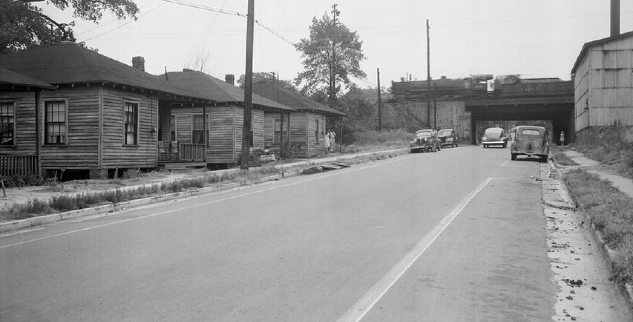 The Line Raleigh old photo of cars on the road est. 1900's