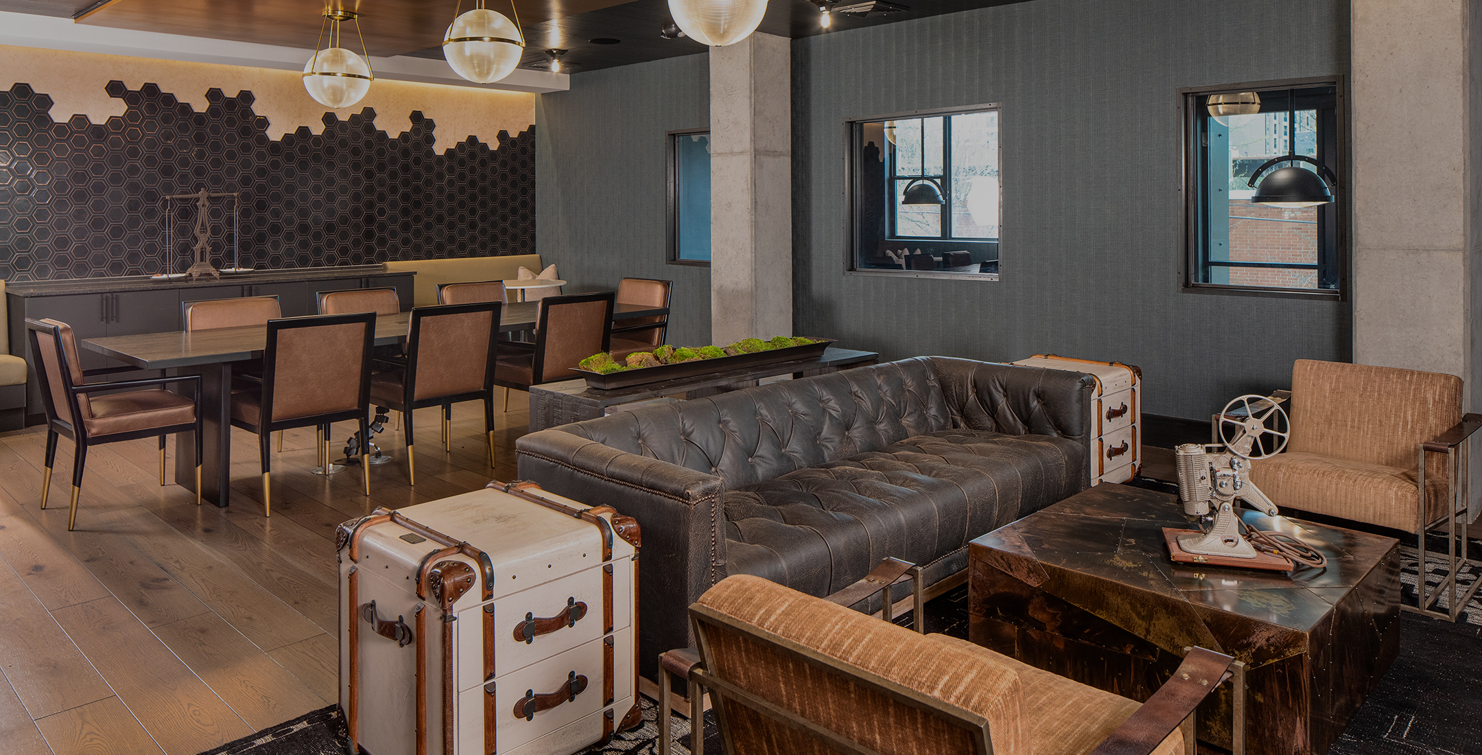 The Line boxcar lounge with social seating and co-working desk space